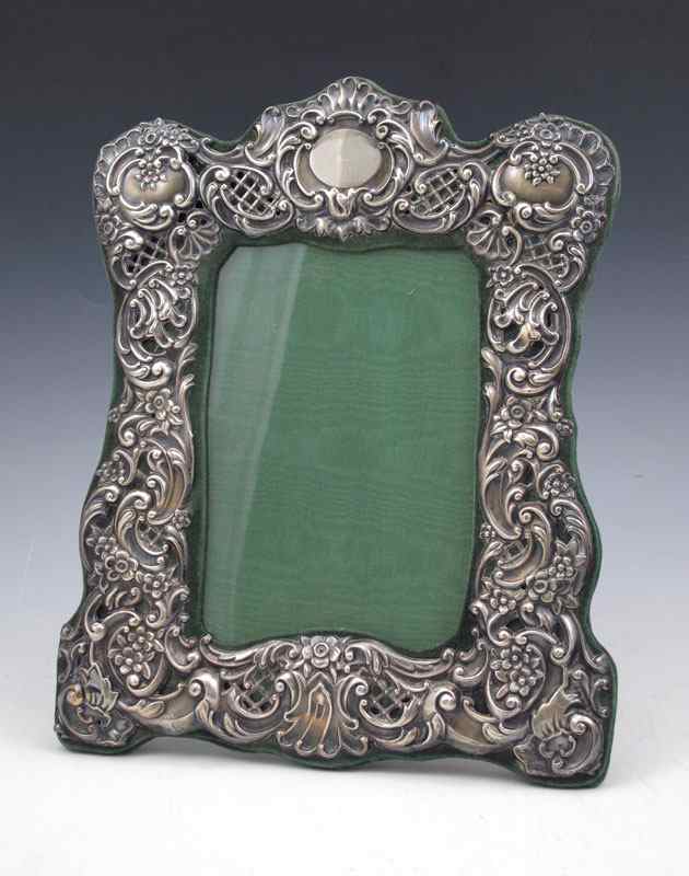 Appraisal: GORHAM REPOUSSE STERLING PICTURE FRAME Repousse sterling over green felt