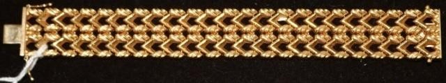 Appraisal: KT GOLD DESIGNER BRACELET LONG X WIDE DWT