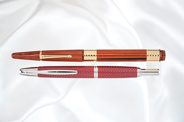 Appraisal: The st pen is a Pilot Vanishing Point Carbonesque red