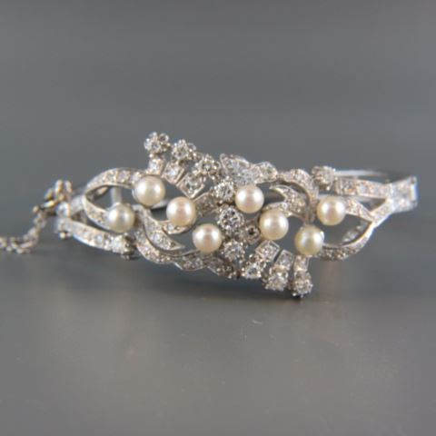 Appraisal: Pearl Diamond Bangle Bracelet round diamonds totaling carats and pearls