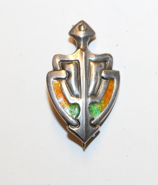 Appraisal: AN ARTS CRAFTS SILVER AND ENAMELLED BROOCH in the form