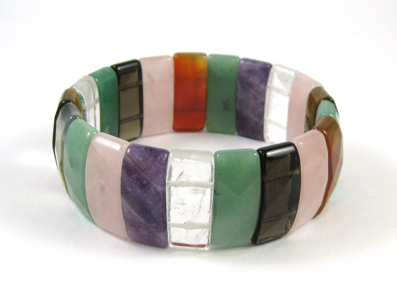 Appraisal: FACETED MULTI-GEMSTONE STRETCH BRACELET with gemstones including amethyst tiger's eye