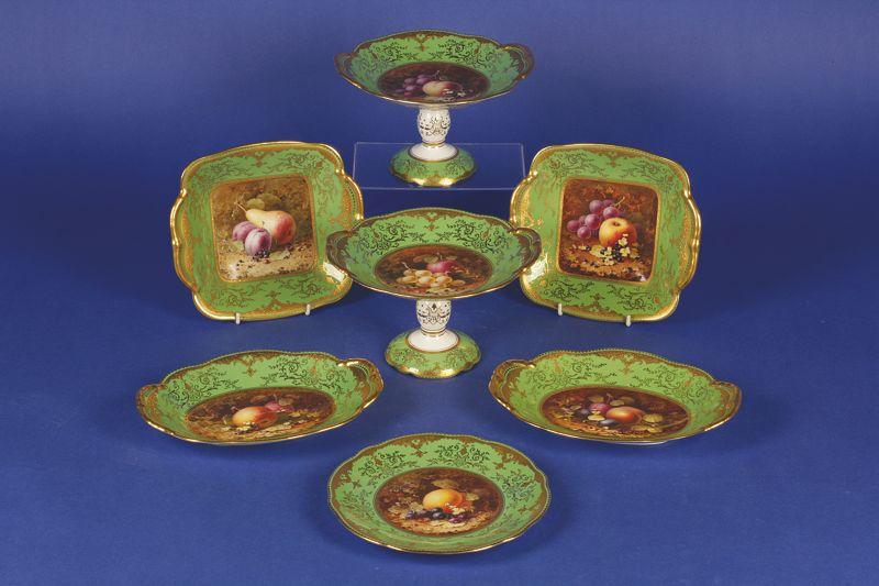 Appraisal: A COALPORT DESSERT SERVICE the central panel painted with autumnal