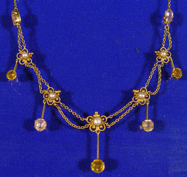 Appraisal: Gold floral pendant set with semi precious stones and pearls