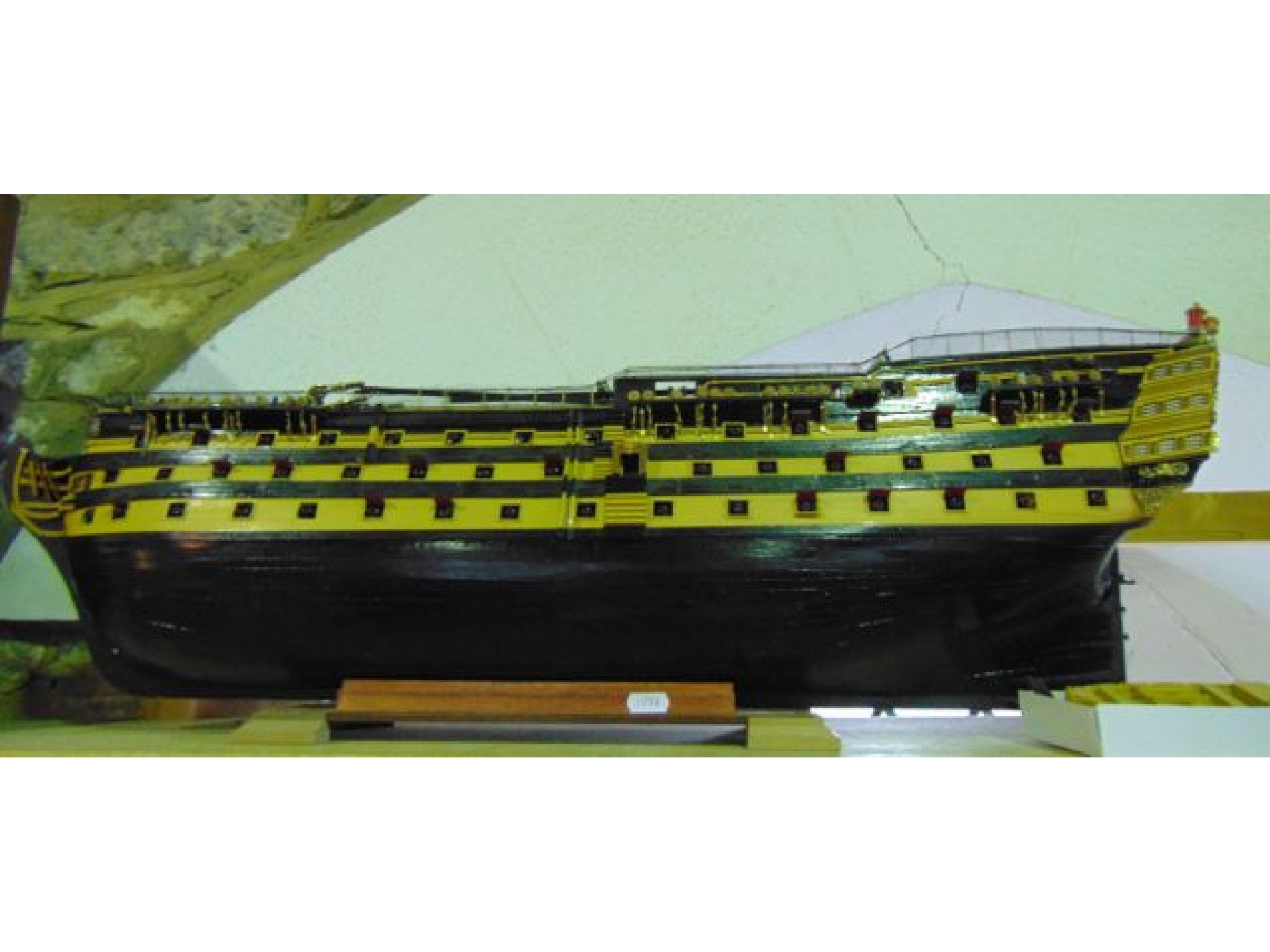 Appraisal: A substantial painted timber model of a gun galleon labelled