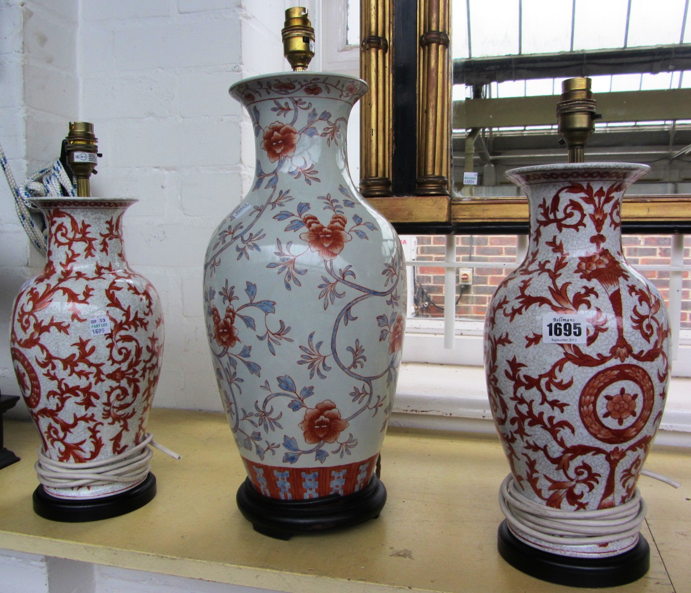 Appraisal: A pair of Chinese style porcelain vase lamps with orange