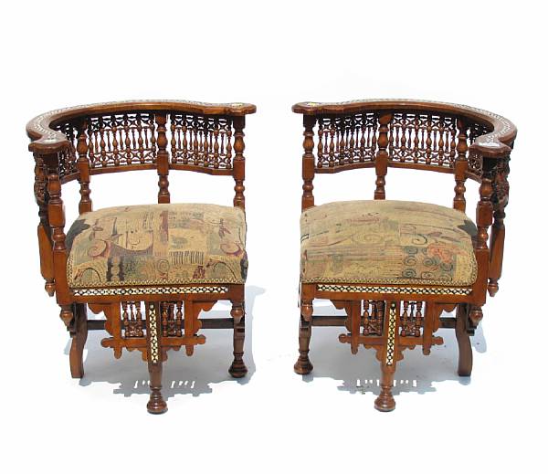 Appraisal: A pair of Moorish style inlaid corner chairs height in