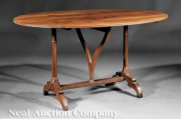 Appraisal: An American Black Walnut Wine Table th c the oval