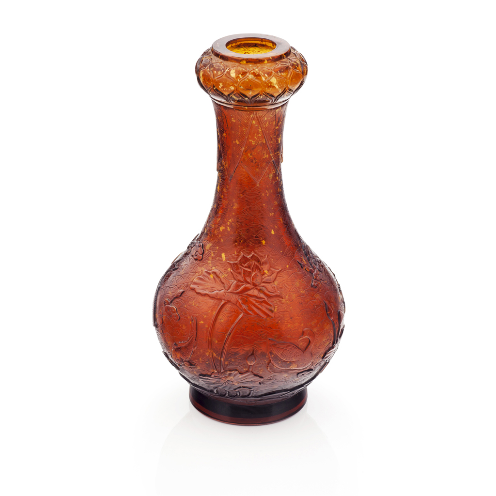 Appraisal: PEKING GLASS VASE the gold-flecked glass of amber colour carved