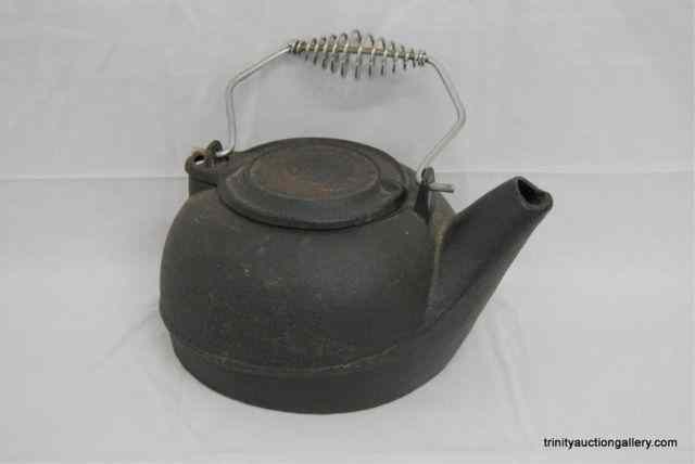 Appraisal: Vintage Cast Iron Tea Pot w Stainles HandleGreat for use