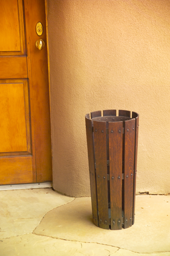 Appraisal: GUSTAV STICKLEY Slatted umbrella stand with riveted rings complete with