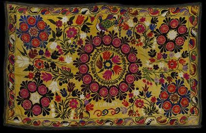 Appraisal: UZBEKISTAN SILK EMBROIDERED COTTON SUZANI Centered by tulip heads with