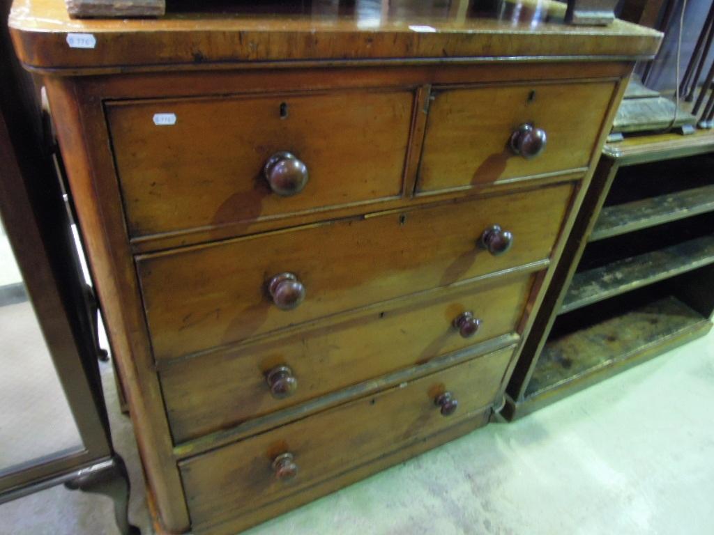 Appraisal: A Victorian mahogany chest fitted with an arrangement of three