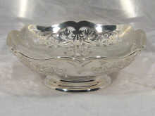 Appraisal: A silver bowl with undulating lobed rim and pierced decoration