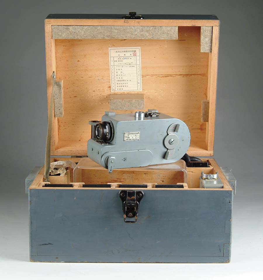 Appraisal: JAPANESE AIRPLANE CAMERA IN ORIGINAL CASE With spare film canisters