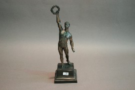 Appraisal: A bronze figure of an athlete cms high