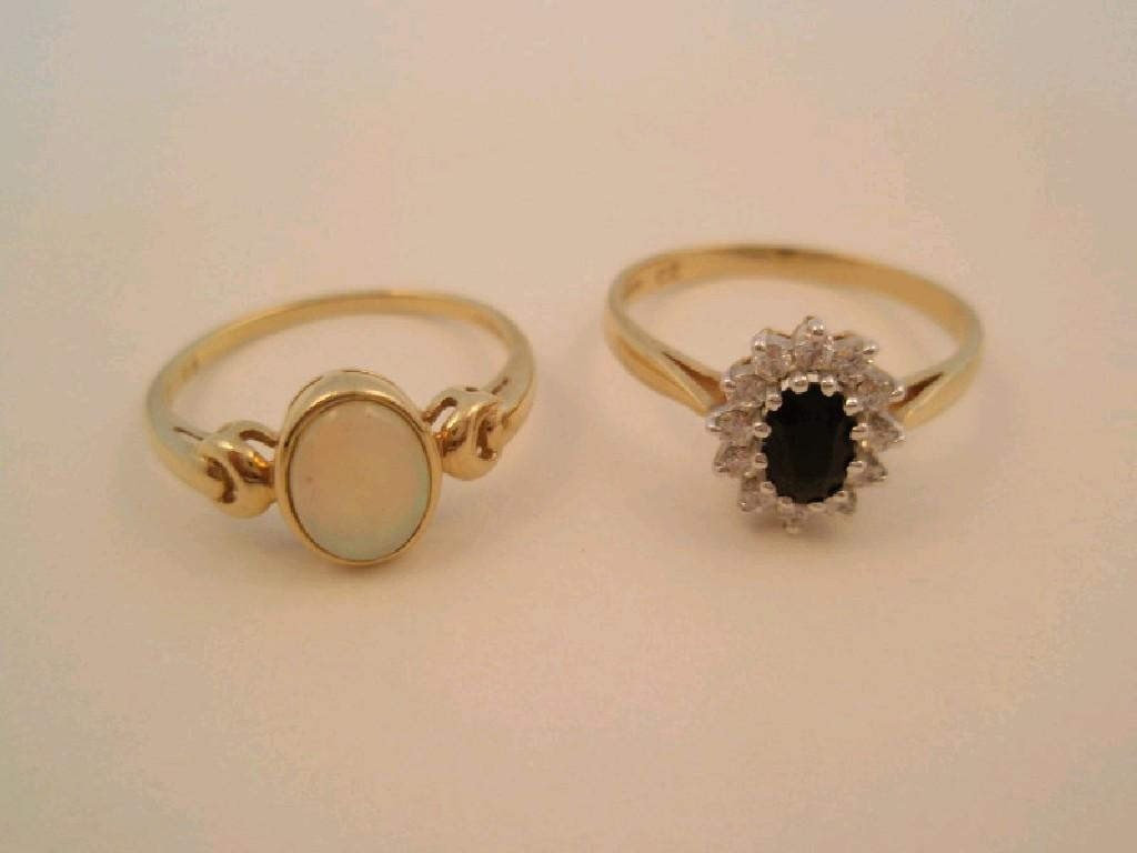 Appraisal: Two ct ladies dress rings one set with an opal