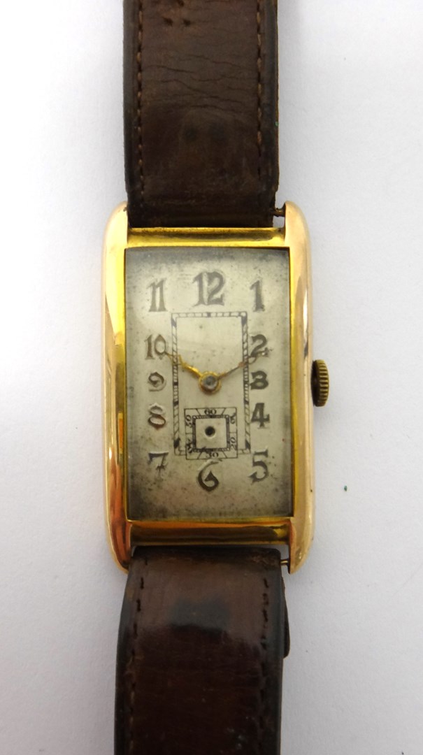 Appraisal: A gentleman's ct gold rectangular cased wristwatch with a circular