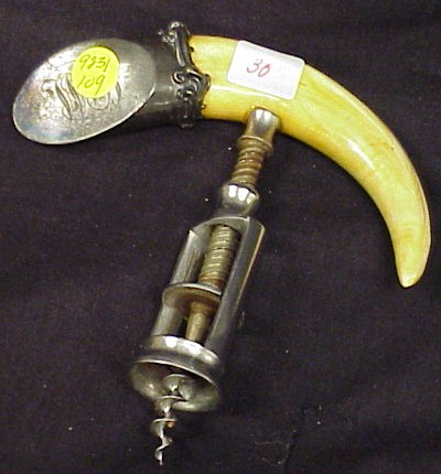 Appraisal: Corkscrew form ivory tusk with monogrammed sterling cap