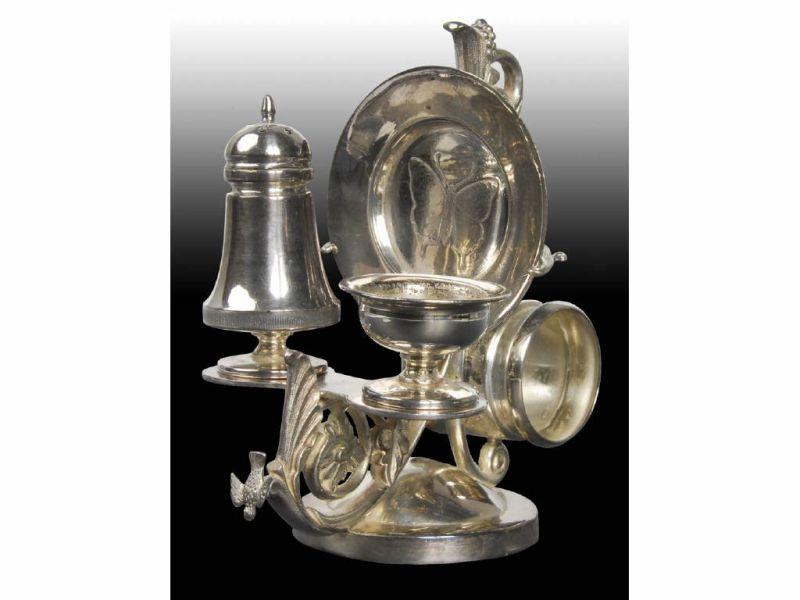 Appraisal: Open Salt Pepper Shaker On Sweeping Scroll Figur Description Upper