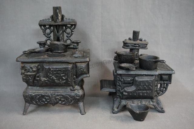 Appraisal: Cast Iron Toy or Display Size Iron Stove Sets Both