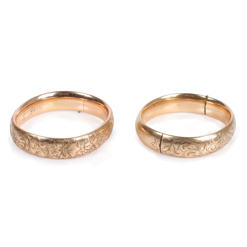 Appraisal: Pair of Victorian gold filled hinged bangle bracelets with etched