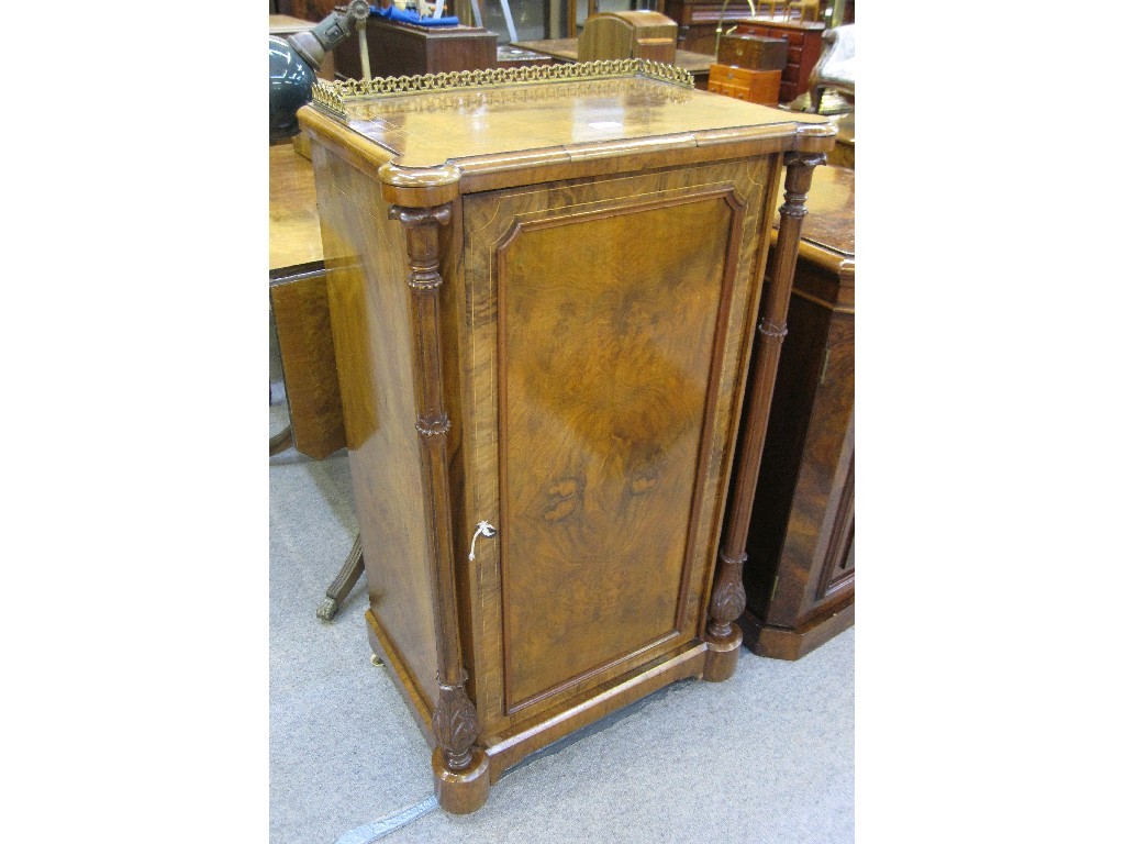 Appraisal: Walnut and string inlaid music cabinet with brass gallery