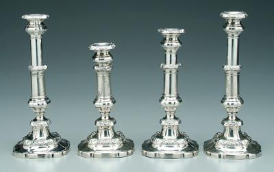 Appraisal: Four telescoping candlesticks silver plated with round posts shaped square