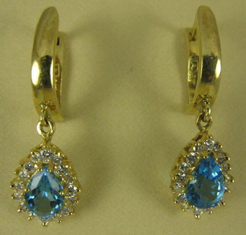 Appraisal: PAIR OF BLUE TOPAZ EARRINGS each k yellow gold and