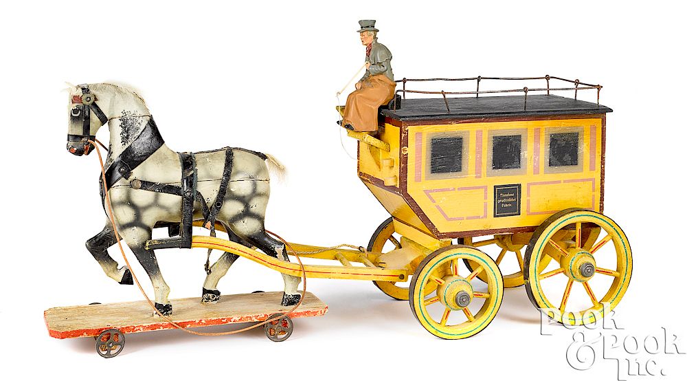 Appraisal: German painted wood horse drawn delivery wagon German painted wood