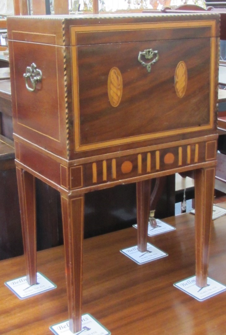 Appraisal: An early th century inlaid mahogany cellarette on tapering square