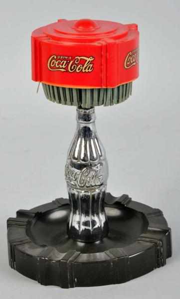 Appraisal: Coca-Cola Match Pull Ashtray s Bottle sets loosely on the