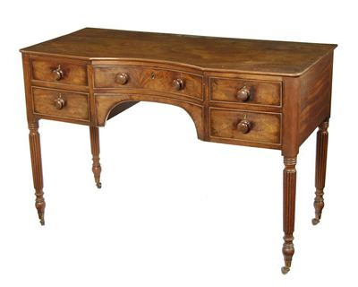 Appraisal: A George IV mahogany dressing table with a concave centre