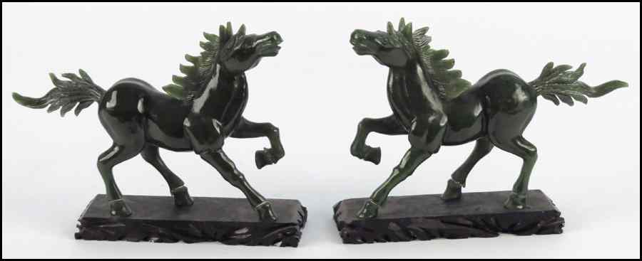 Appraisal: PAIR OF CHINESE CARVED SERPENTINE HORSES L '' Condition No