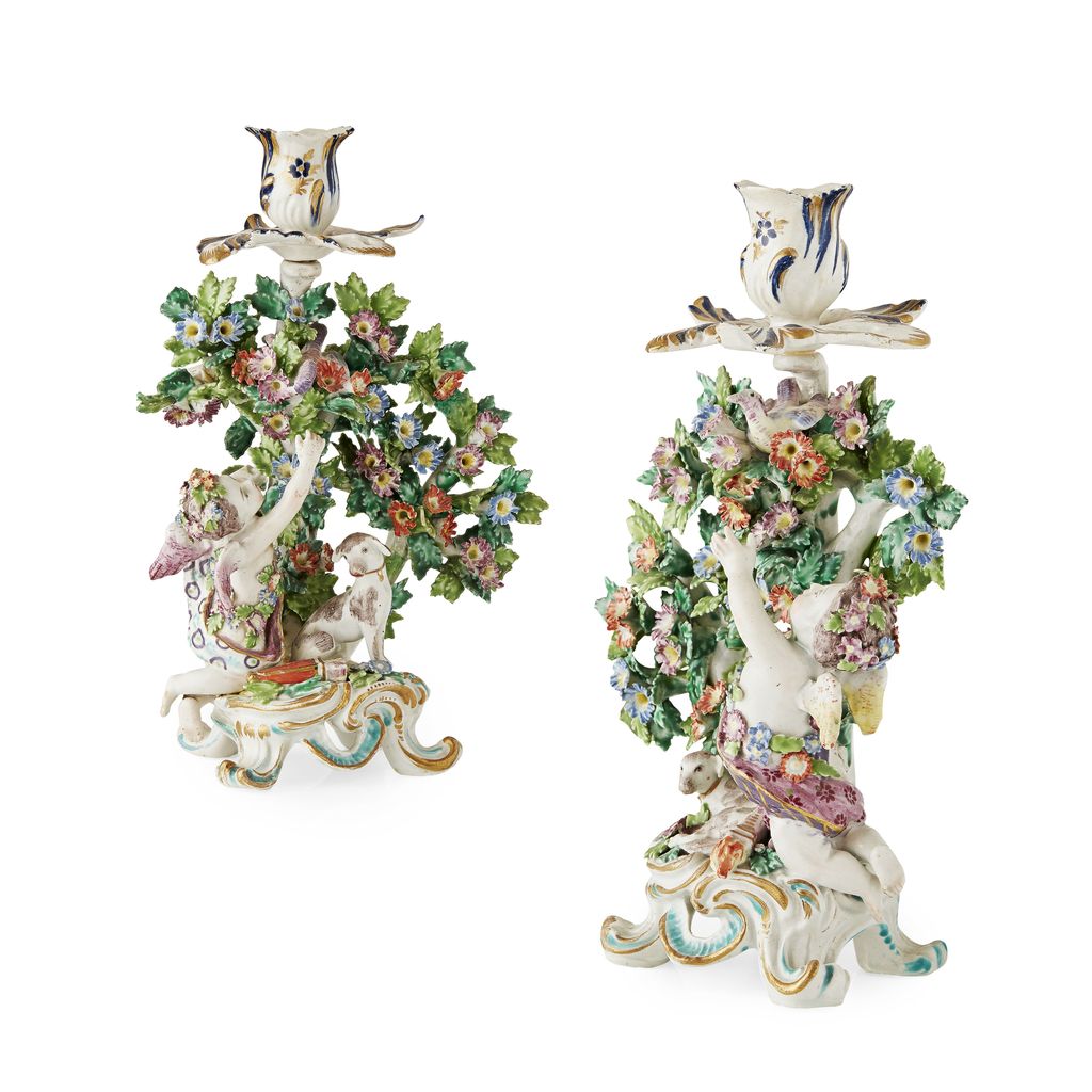 Appraisal: PAIR OF CHELSEA-BOW PORCELAIN CANDLESTICKS LATE TH CENTURY each modelled