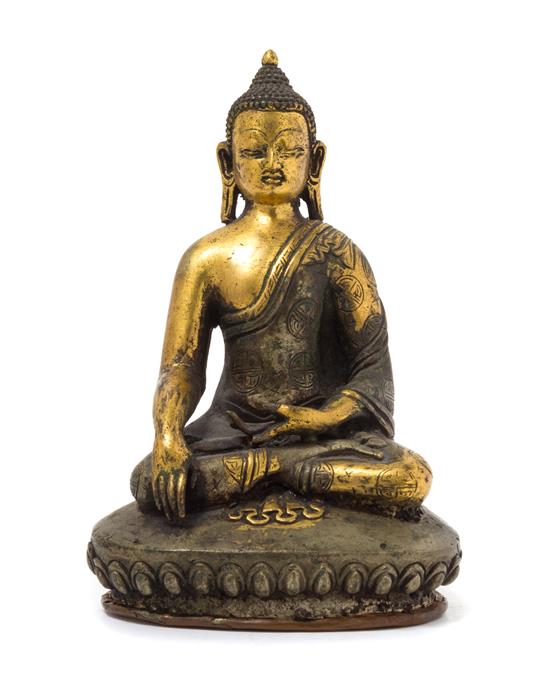 Appraisal: Sale Lot A Sino-Tibetan Gilt Bronze Figure of Seated Buddha