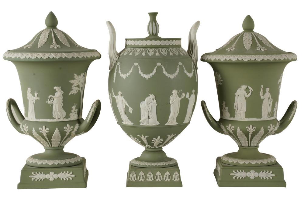 Appraisal: THREE WEDGWOOD GREEN JASPERWARE COVERED URNSstamped Wedgwood Made in England