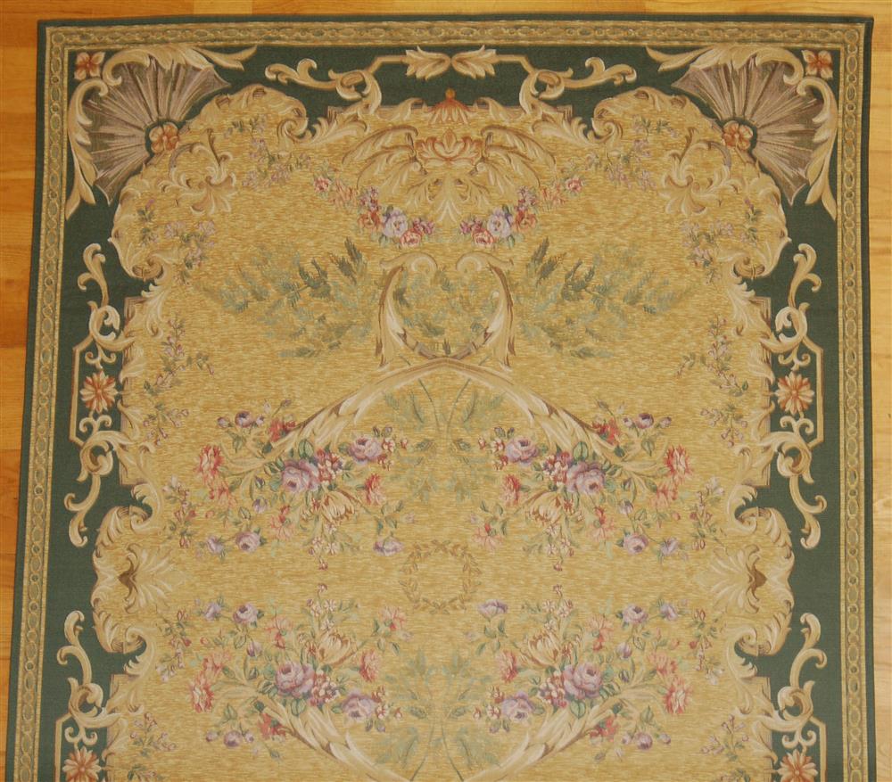 Appraisal: FLORAL FABRIC RUG considered a wall hanging consisting of a