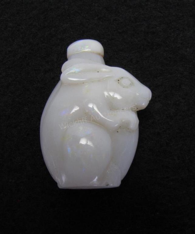 Appraisal: Oriental Opal Snuff Bottle white opal carved rabbit decoration white