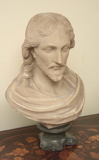 Appraisal: A TH CENTURY ALABASTER PORTRAIT BUST of Christ on a