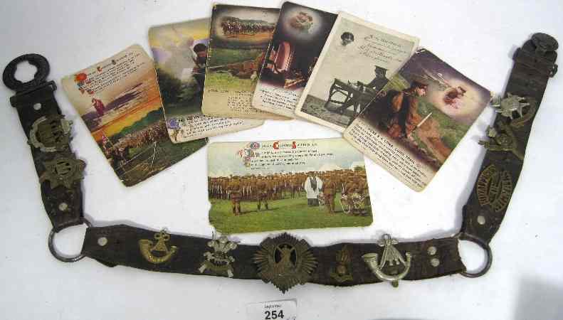 Appraisal: World War Belt with Various Badges to include Royal North