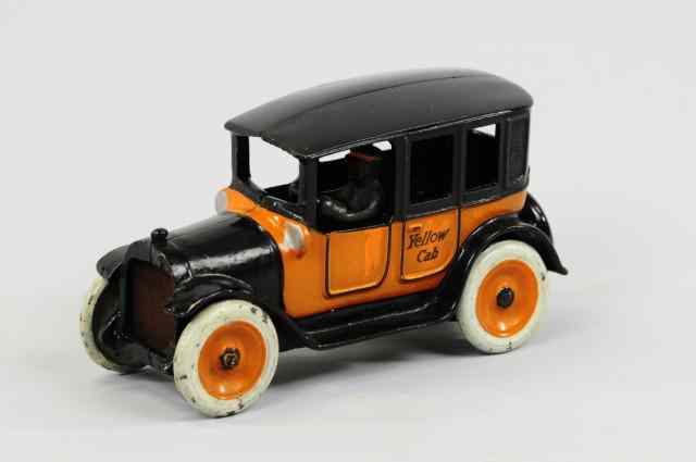 Appraisal: YELLOW CAB Arcade cast iron painted orange and black 'Yellow