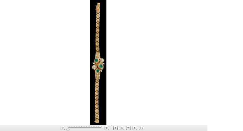 Appraisal: karat yellow gold emerald and diamond braceletCentral panel of floral