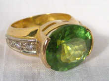 Appraisal: A yellow metal tests high carat gold peridot ring the