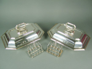 Appraisal: A pair of epns four division arched toast racks by