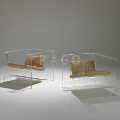 Appraisal: LUCITE Pair of club chairs USA s Acrylic and calf