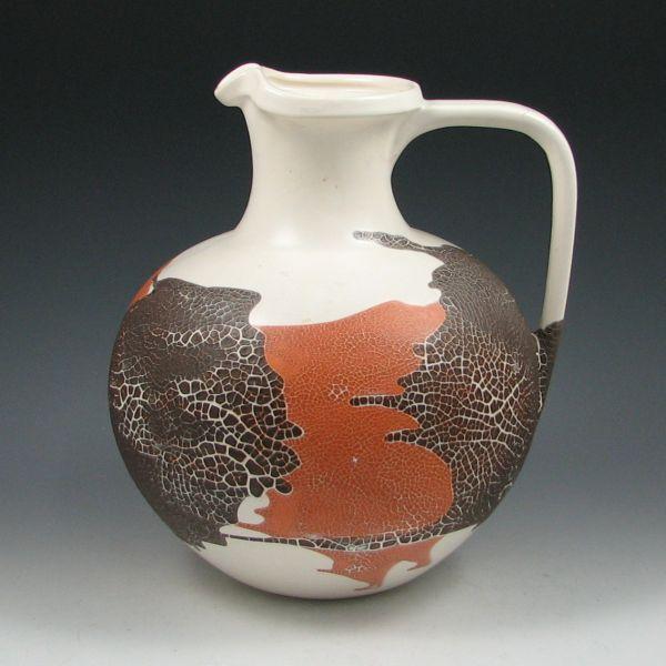 Appraisal: Royal Haeger pottery pitcher with earth wrap glaze treatment Unmarked