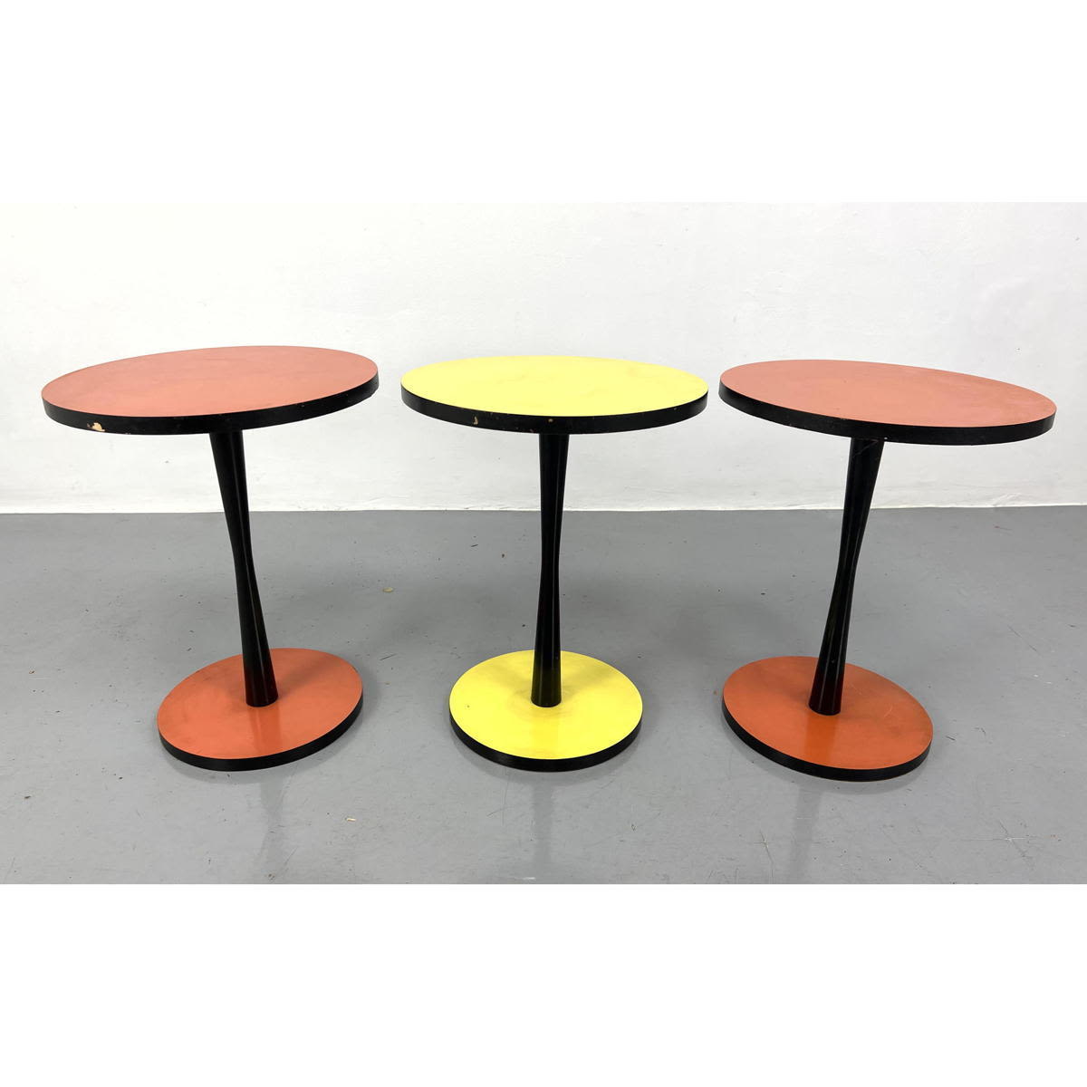 Appraisal: pc Red or Yellow Ebonized Stand Side Tables Round Tops