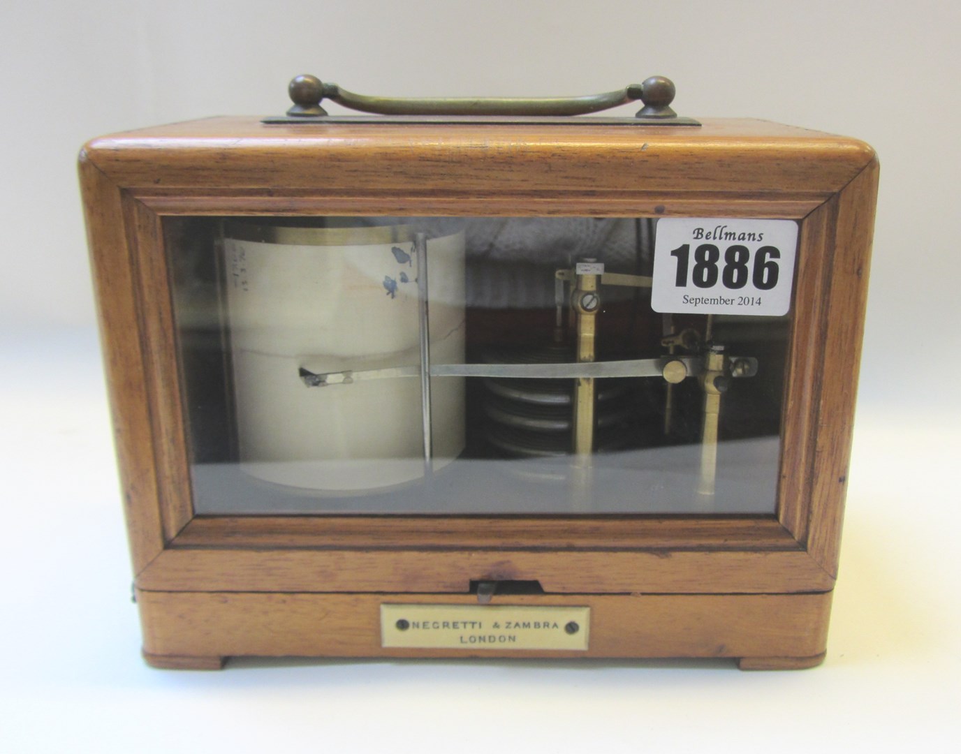 Appraisal: Negretti and Zambra A portable mahogany barograph with brass carrying