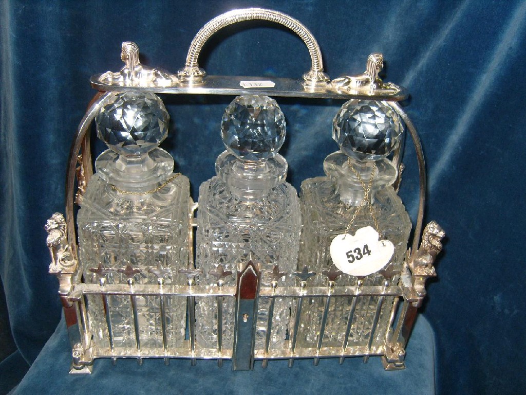 Appraisal: A good quality th century silver plated tantalus in the